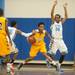 Ypsilanti's Corey Allen tries to break free form his Skyline guards during their game at Skiyline High school Tuesday, Jan. 15.

Courtney Sacco I AnnArbor.com  